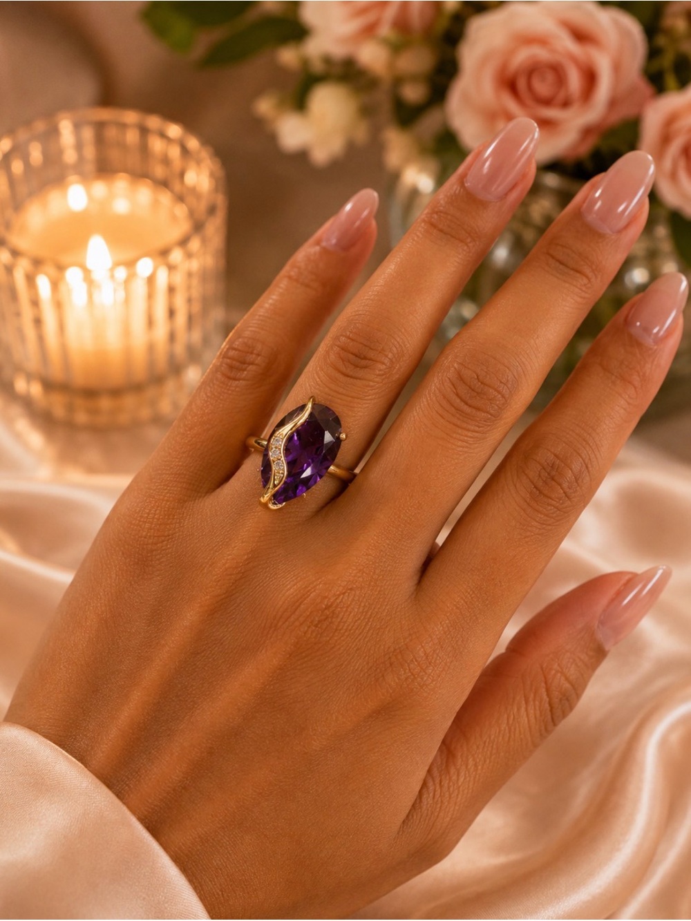 Gold Ring with Purple Teardrop Gemstone